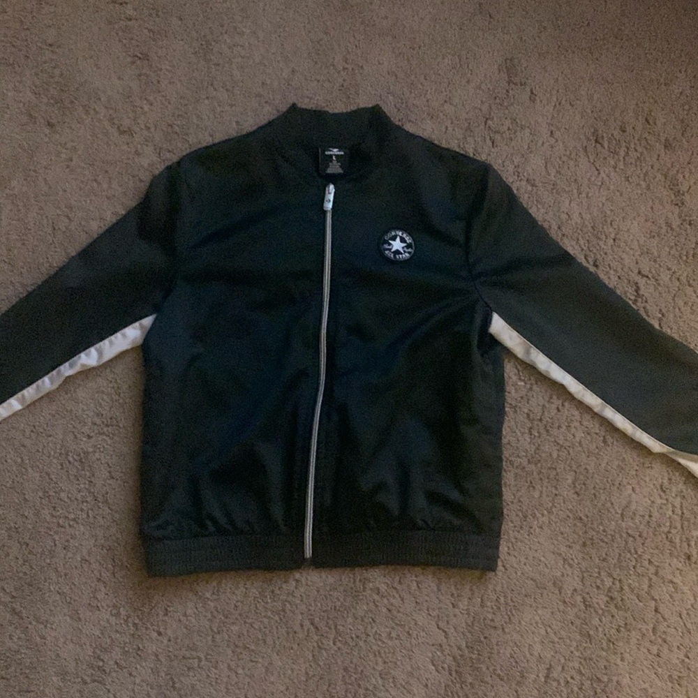 Nice Converse black and silver jacket with zipper size girl’s large.